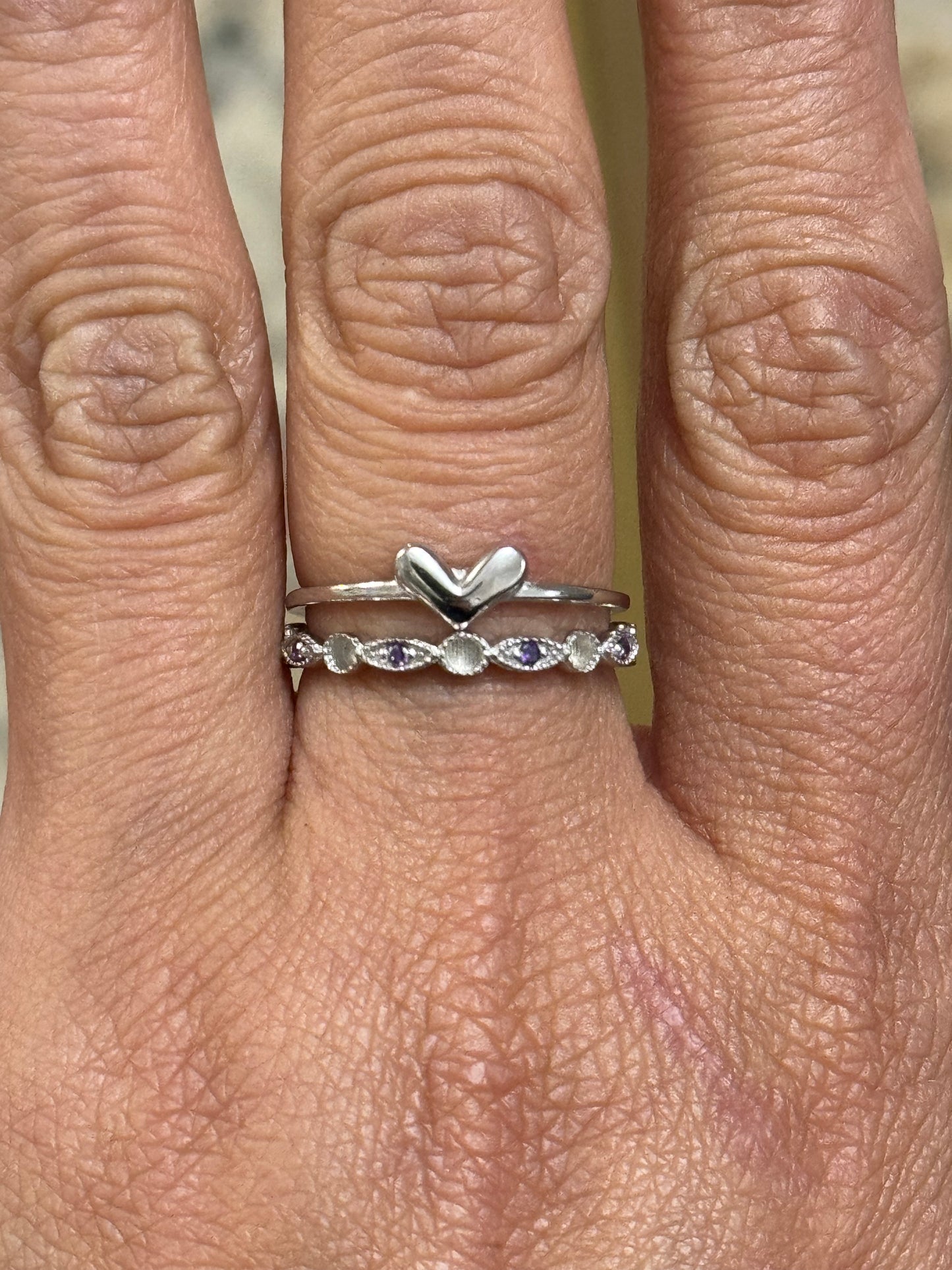 Such a cute ring set!
Queen stacker with June or Feb stones (can pass for either)
Size about 6.5 

$155 for both