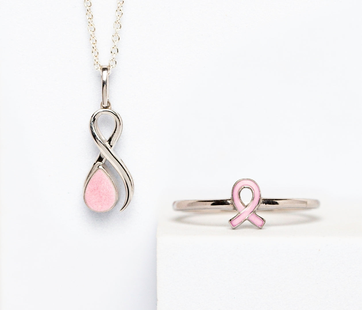 Breast Cancer Warrior Collection pendant and ring with pink stone inclusions — handcrafted breastmilk jewelry honoring strength and healing by Mamma’s Liquid Love
