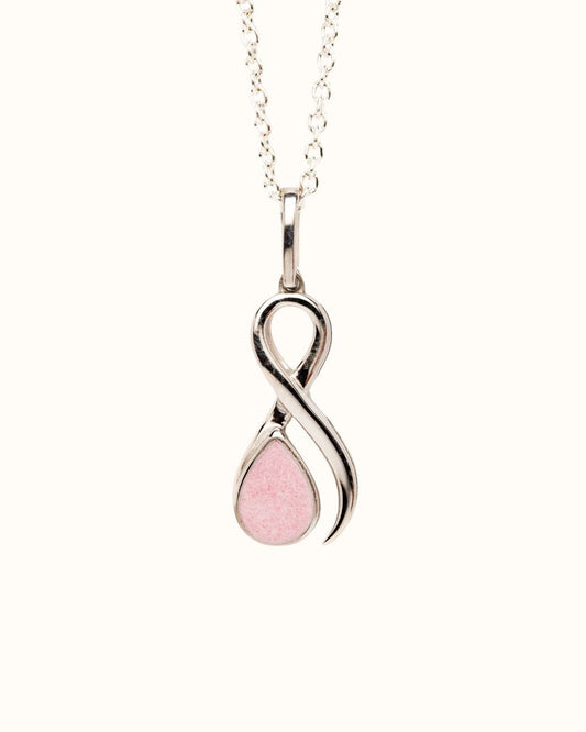 Sterling silver Ribbon of Hope breast milk jewelry pendant with pink inclusion for breast cancer awareness